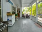 Relax to Fresh Air on Common Screened Lanai.