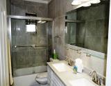 Bathroom with Tub/Shower Combo and Double Sinks