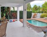 Play Corn Hole or Lounge by the Pool