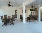 Dine or Relax in Shaded Poolside Lounge