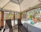 Screened Pergola for Lounging in the Shade
