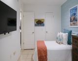 Walk-In Closet and Mounted TV